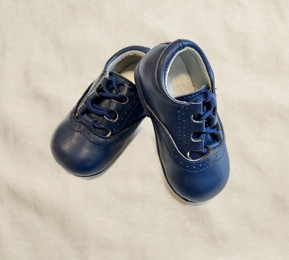 Alfie Lace-up Dress Shoe for Kids, Wide Toe Box on cream linen background — view 3