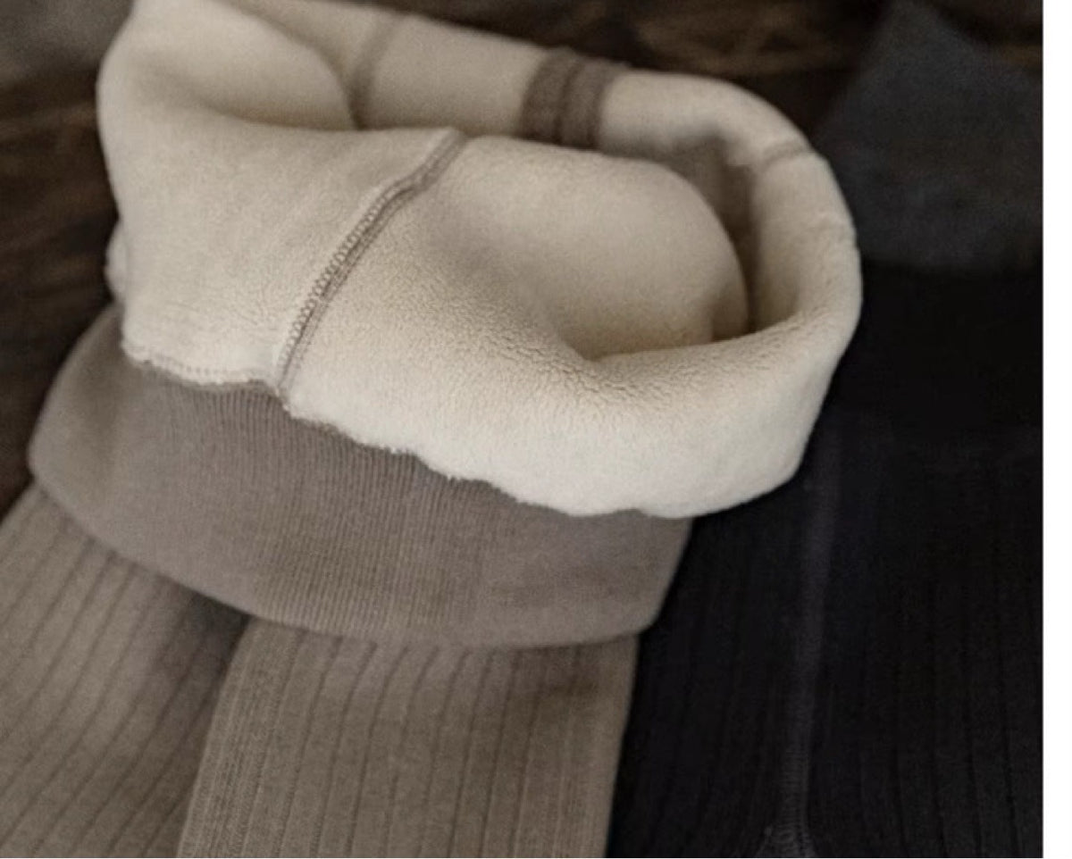 Close-up of plush fleece lining inside Ozznek toddler leggings – soft and warm