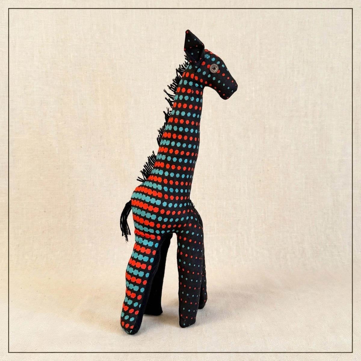 Handmade African kente fabric giraffe plush from Zanzibar, Tanzania - one of a kind stuffed animal gift for kids