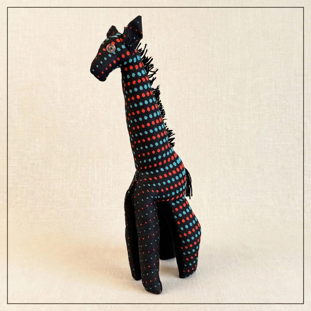 Handmade African kente fabric giraffe plush from Zanzibar, Tanzania - one of a kind stuffed animal gift for kids