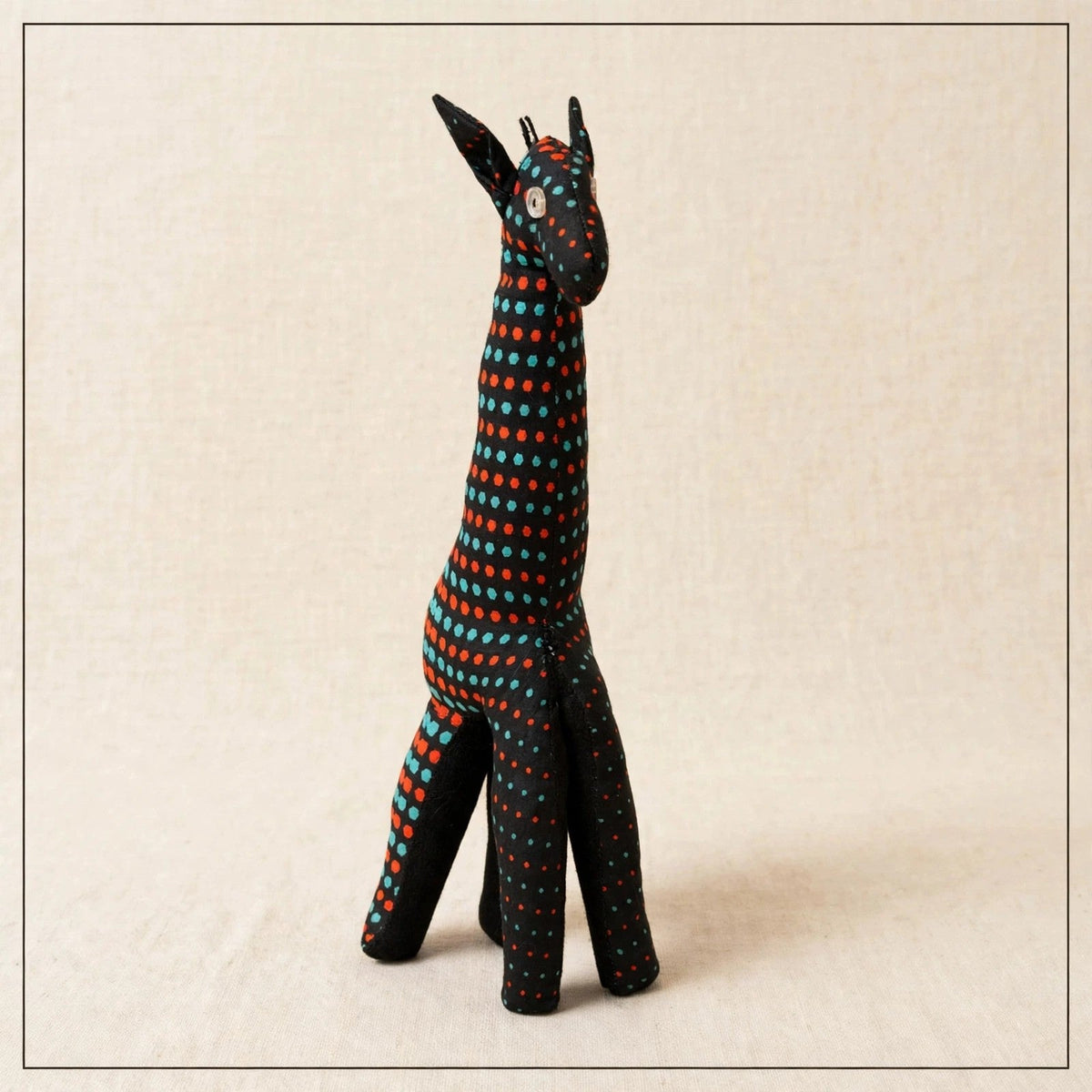 Handmade African kente fabric giraffe plush from Zanzibar, Tanzania - one of a kind stuffed animal gift for kids