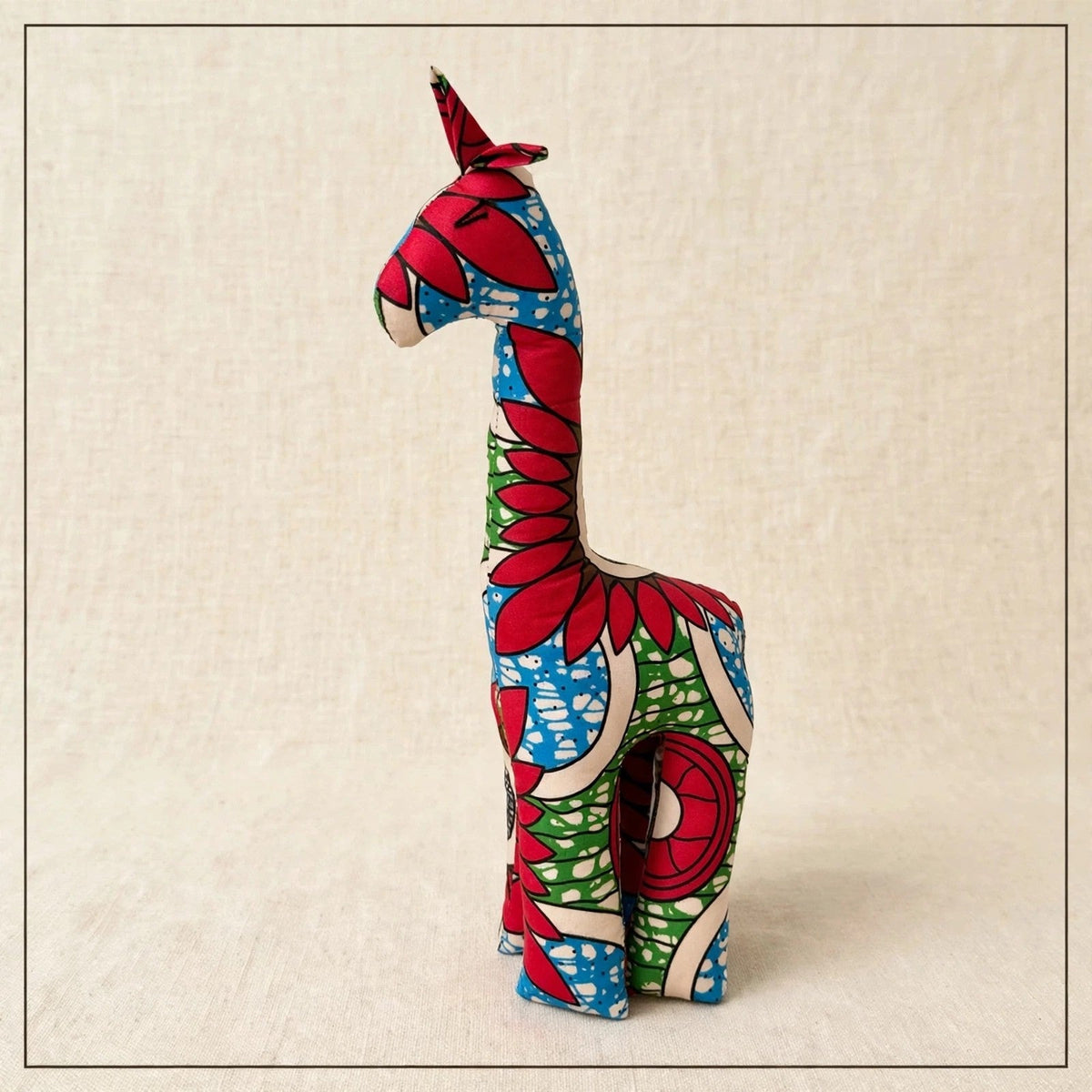 Handmade African kente fabric giraffe plush from Zanzibar, Tanzania - one of a kind stuffed animal gift for kids