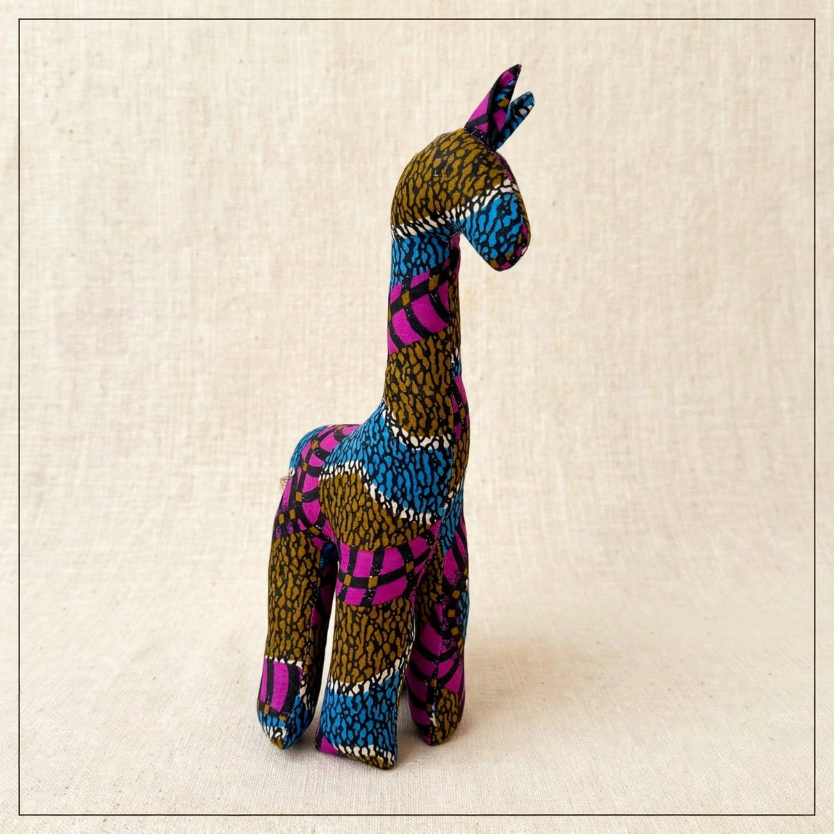 Handmade African kente fabric giraffe plush from Zanzibar, Tanzania - one of a kind stuffed animal gift for kids