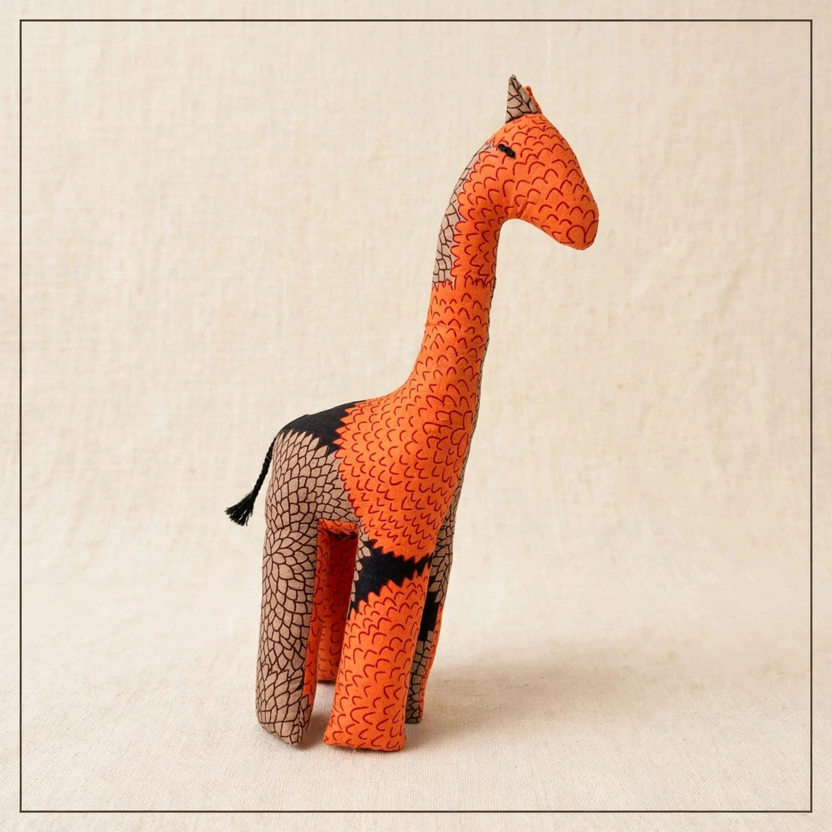 Handmade African kente fabric giraffe plush from Zanzibar, Tanzania - one of a kind stuffed animal gift for kids