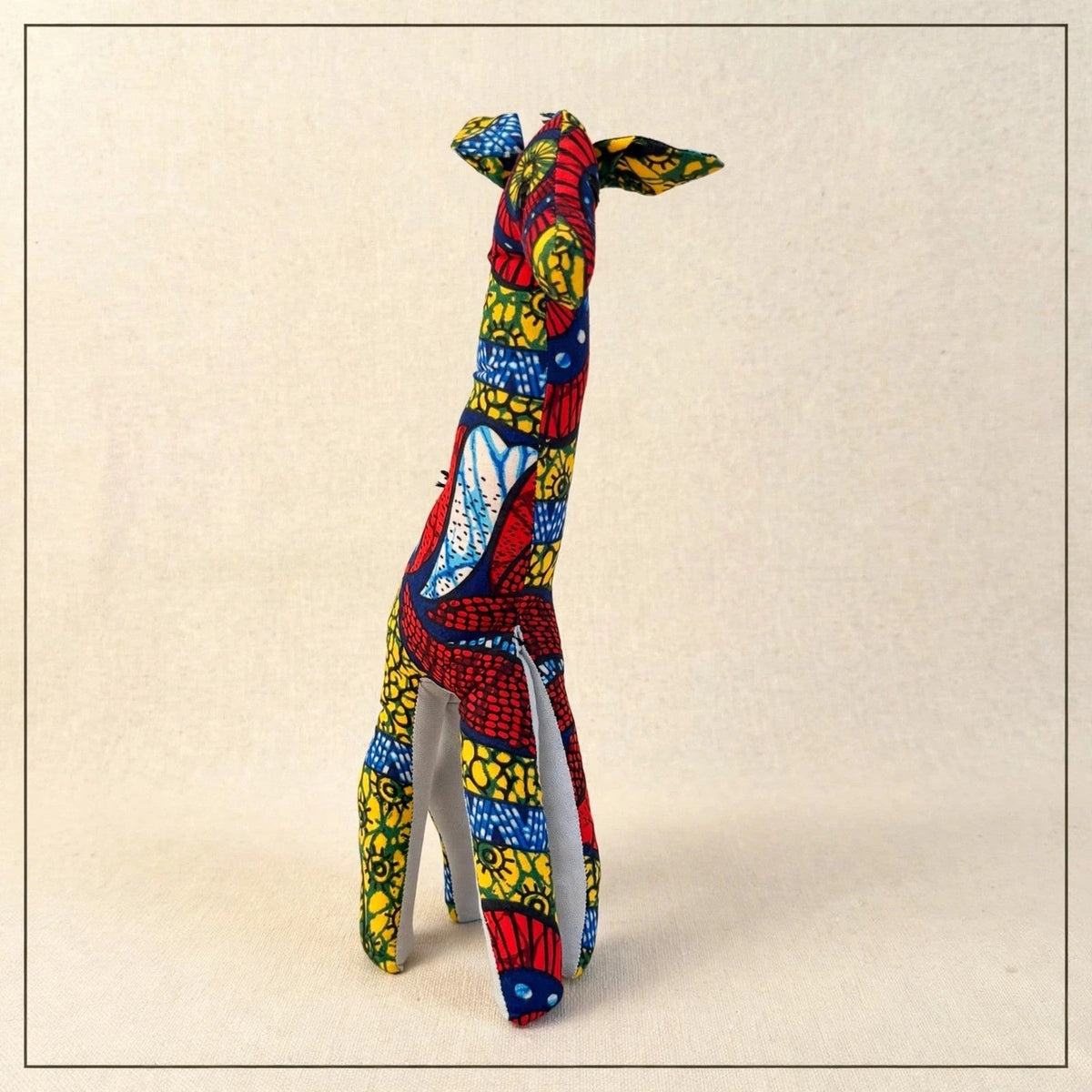 Handmade African kente fabric giraffe plush from Zanzibar, Tanzania - one of a kind stuffed animal gift for kids