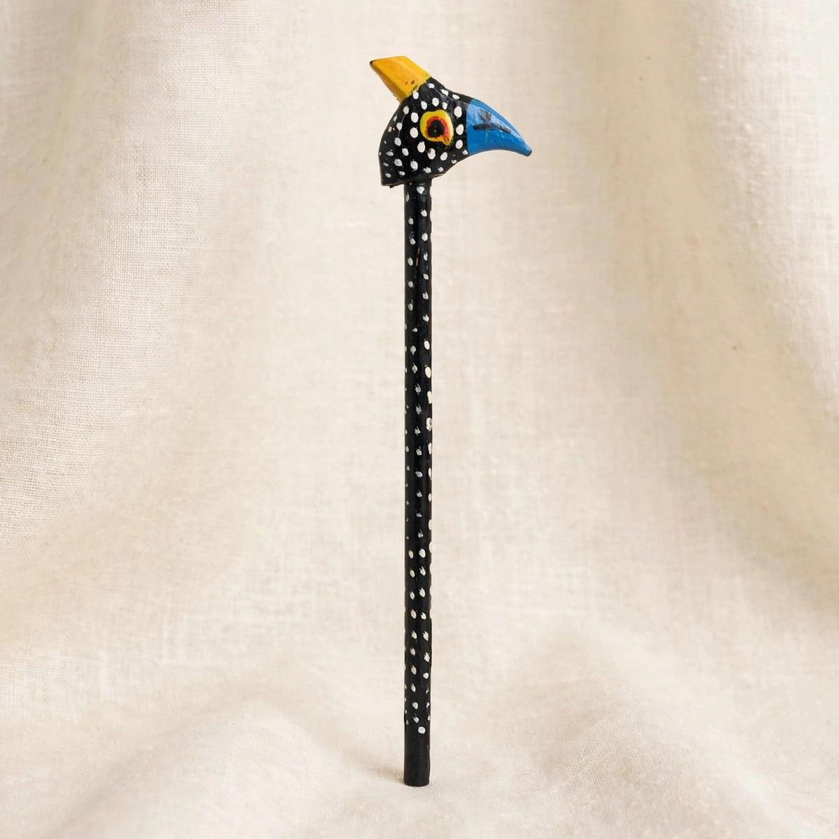 Hand-carved wooden pencil with a guinea fowl head, second view