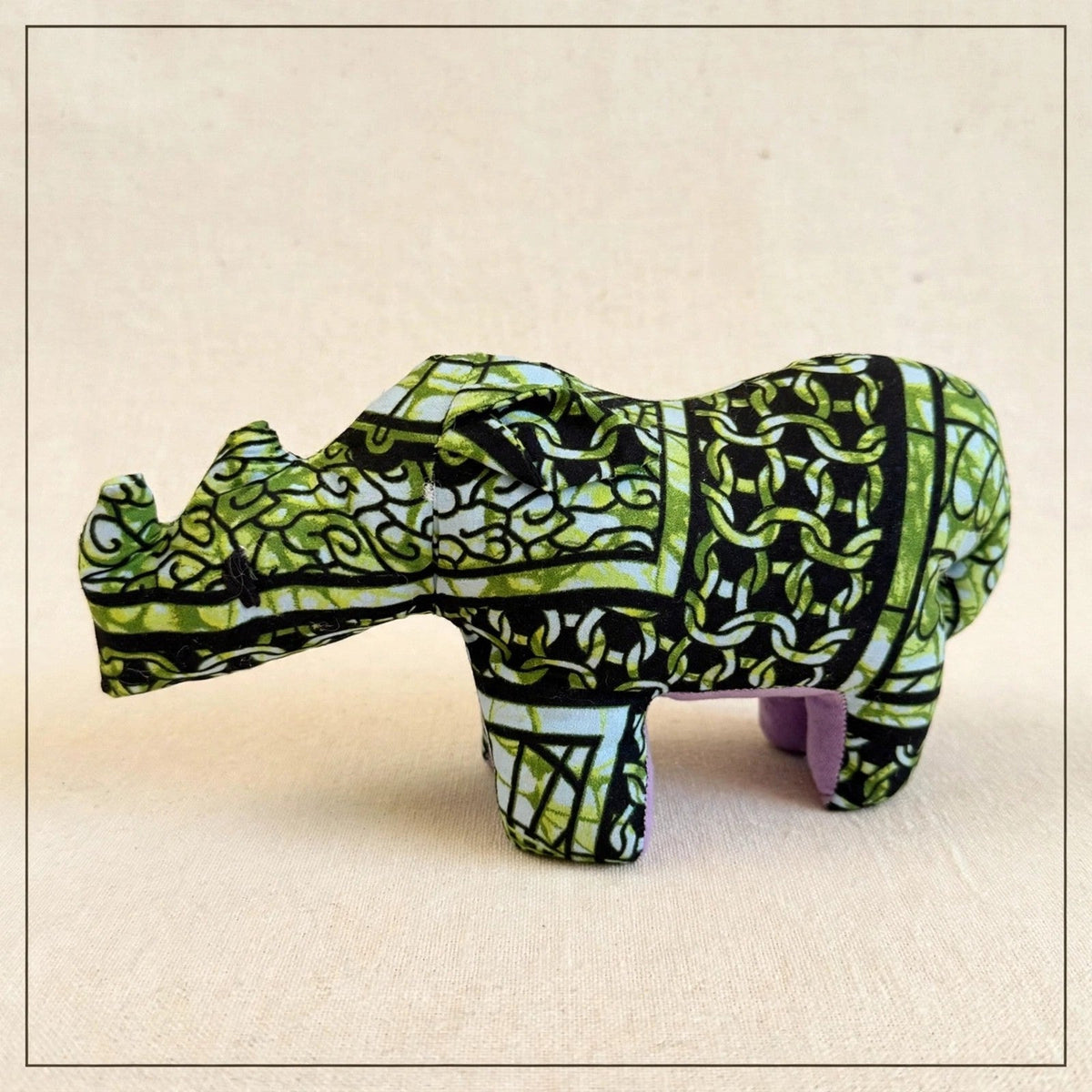 Handmade African kente fabric rhino plush from Zanzibar, Tanzania - one of a kind stuffed animal gift for kids