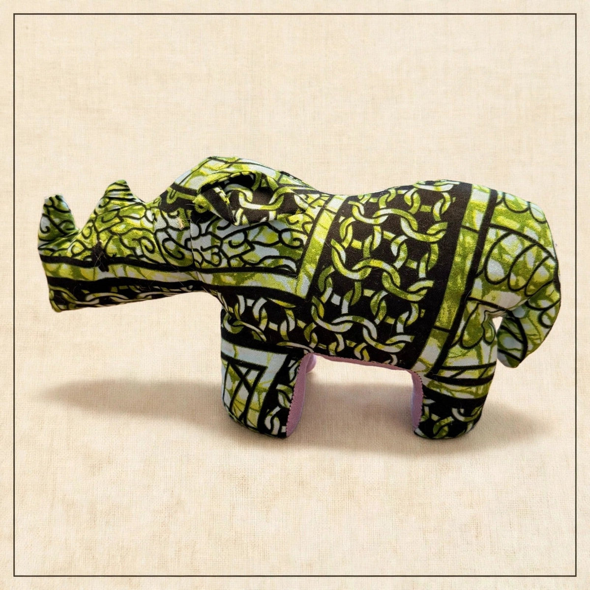 Handmade African kente fabric rhino plush from Zanzibar, Tanzania - one of a kind stuffed animal gift for kids