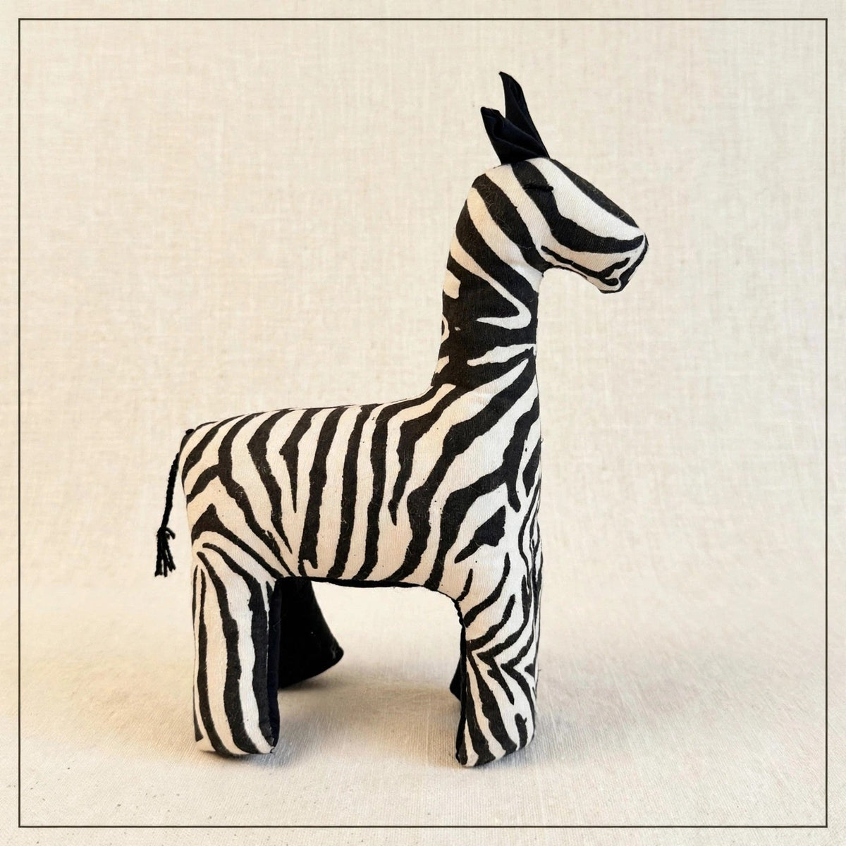 Handmade African kente fabric zebra plush from Zanzibar, Tanzania - one of a kind stuffed animal gift for kids