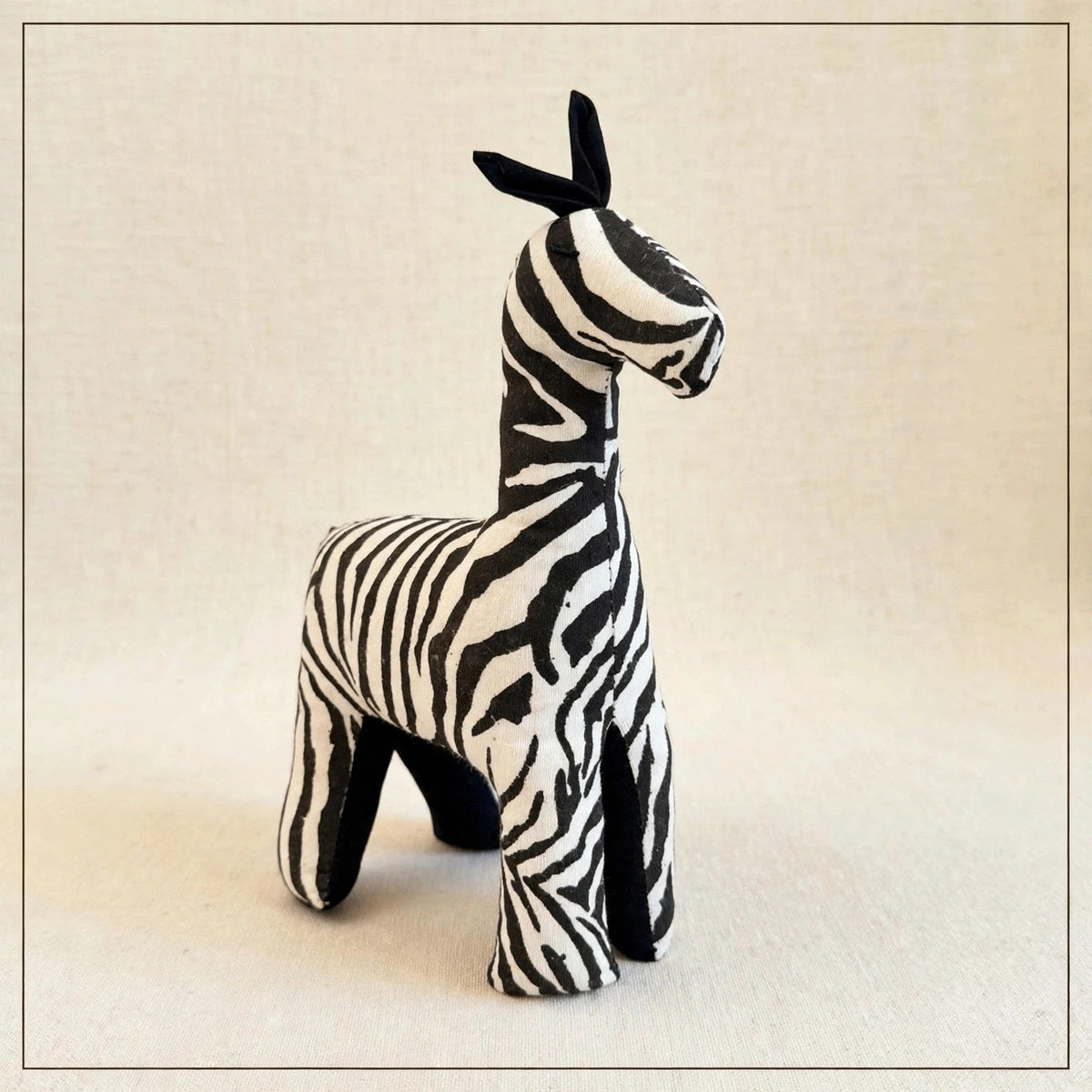 Handmade African kente fabric zebra plush from Zanzibar, Tanzania - one of a kind stuffed animal gift for kids