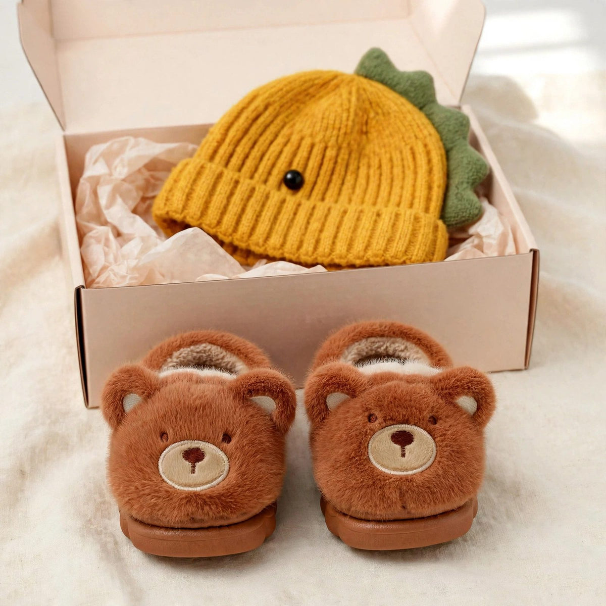 Cozy slippers and beanie gift set for toddlers - fuzzy bear house slippers and hand-knitted dinosaur beanie in a gift box